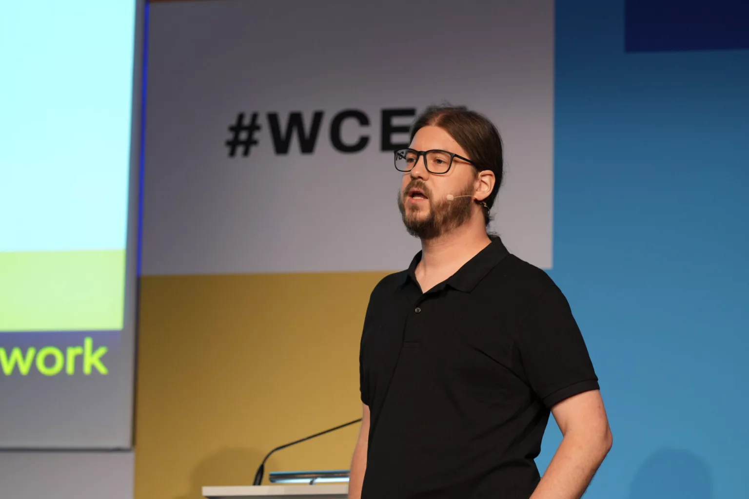 Marcel Tannich on stage at WordCamp Europe 2025